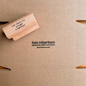 Tom added a photo of their purchase