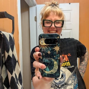 Caitlin added a photo of their purchase