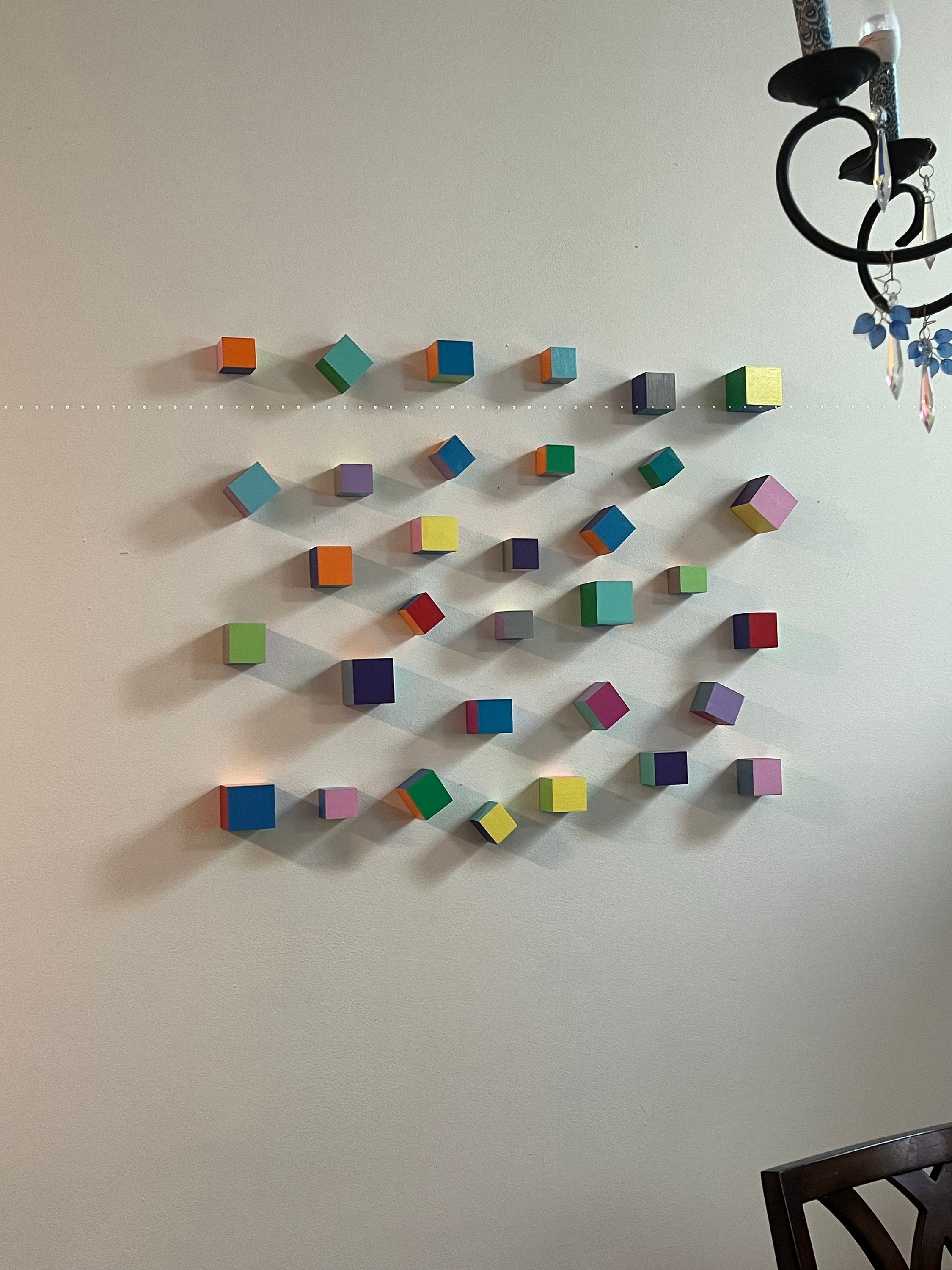 Modern Sculpture 3D wood wall art. © Hand-painted wooden cubes with vibrant bold colors. You can choose the number of wood cubes and sizes.