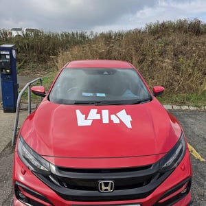 Natasha added a photo of their purchase