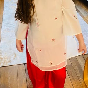 Isabelle Le added a photo of their purchase
