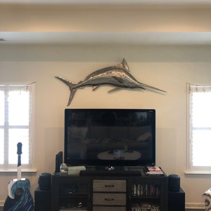 John added a photo of their purchase