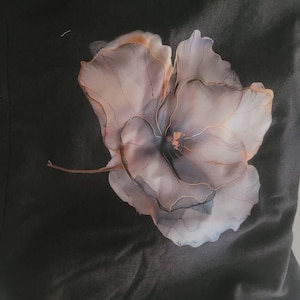 Laura added a photo of their purchase