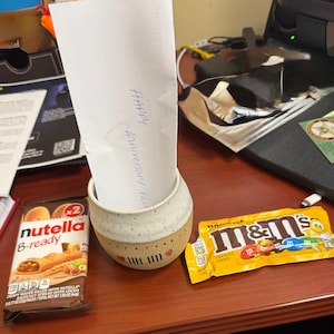 Aisha added a photo of their purchase