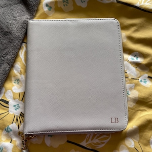 Laura added a photo of their purchase
