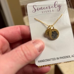 Sarah added a photo of their purchase