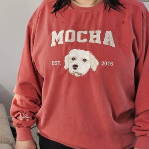 Francesca added a photo of their purchase