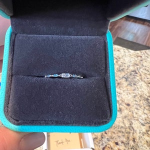 Nicole added a photo of their purchase