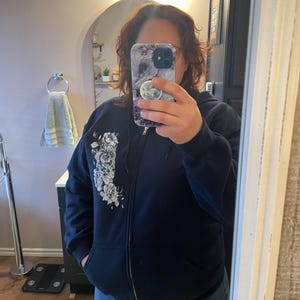 Sarah added a photo of their purchase