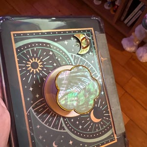Maggie added a photo of their purchase
