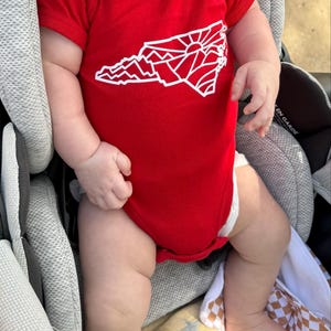 Olivia added a photo of their purchase