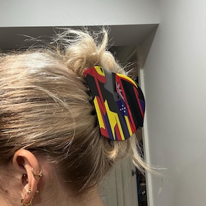 Ellie added a photo of their purchase