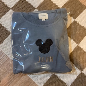 Mayra added a photo of their purchase