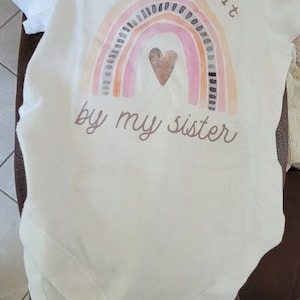 Gina added a photo of their purchase