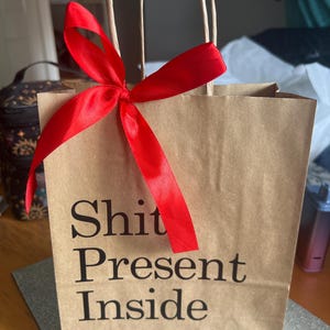 Natasha added a photo of their purchase