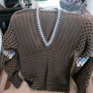 Nicola added a photo of their purchase