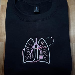 Crystal added a photo of their purchase