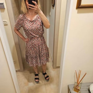 Elisabetta added a photo of their purchase