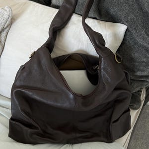 Isabel added a photo of their purchase