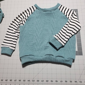 Nikki added a photo of their purchase