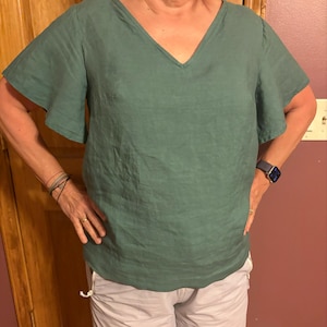 Sarah added a photo of their purchase
