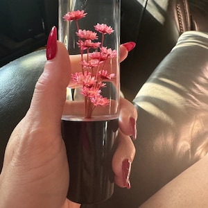 Natasha added a photo of their purchase