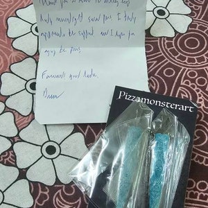 Ahmed added a photo of their purchase