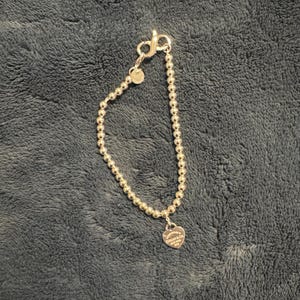 Charlotte added a photo of their purchase