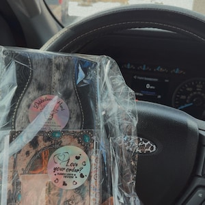 Taylor added a photo of their purchase