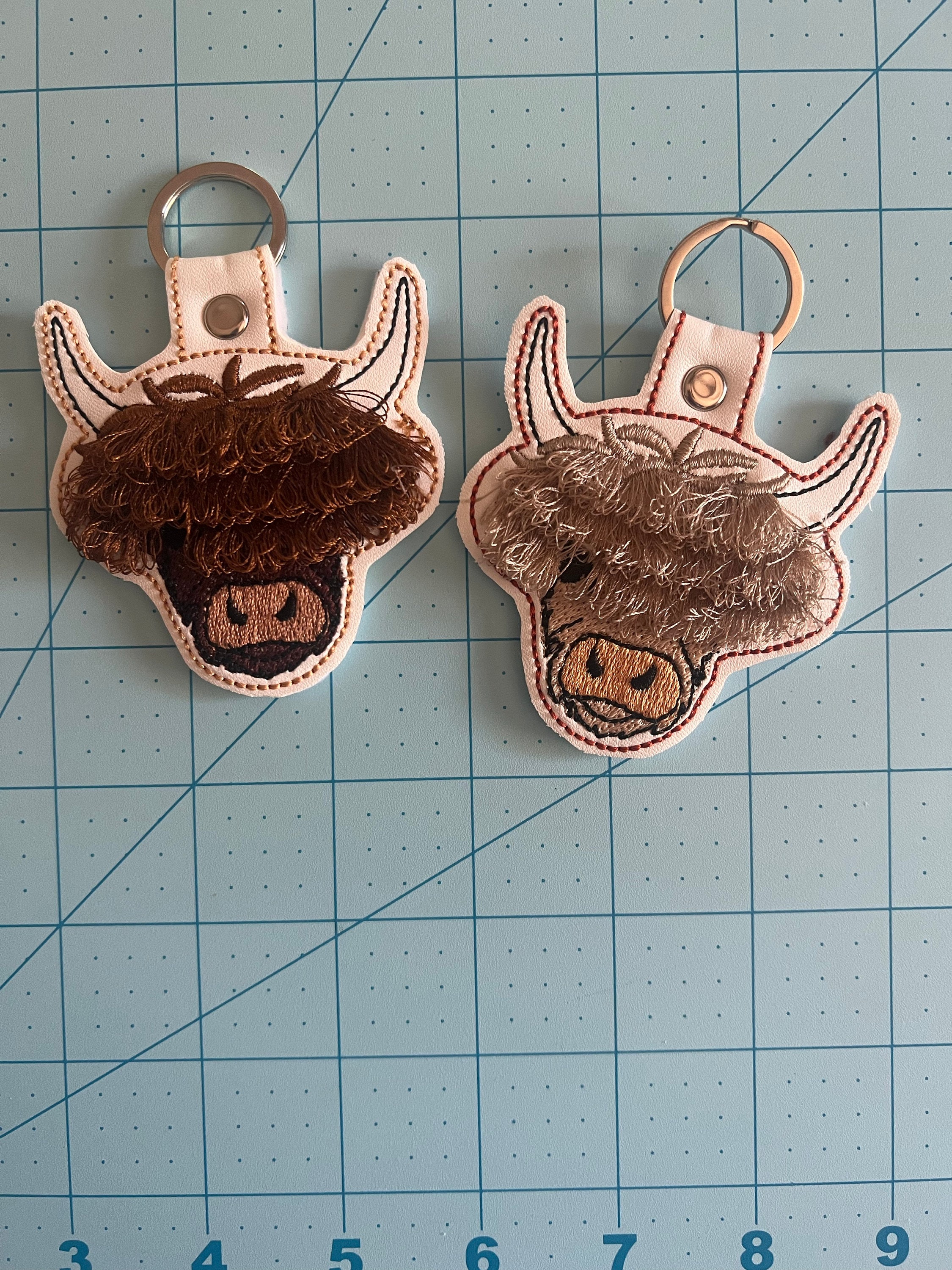Fringed Highland cow keychain key fob snap tab in the hoop machine embroidery designs ITH project Awesome fluffy fur cow kids backpack tag