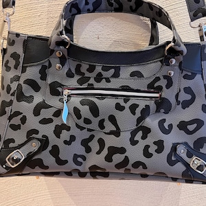 Daniela added a photo of their purchase