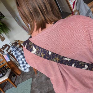 Melanie added a photo of their purchase