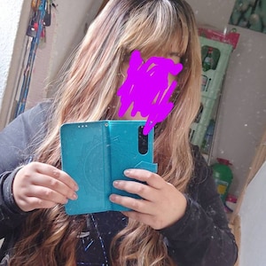 Jasmin added a photo of their purchase
