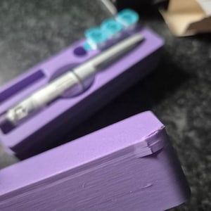Katie added a photo of their purchase