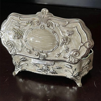 Imperial Portrait Faberge Secret Egg. This is a 4.7 in Egg and Opens to