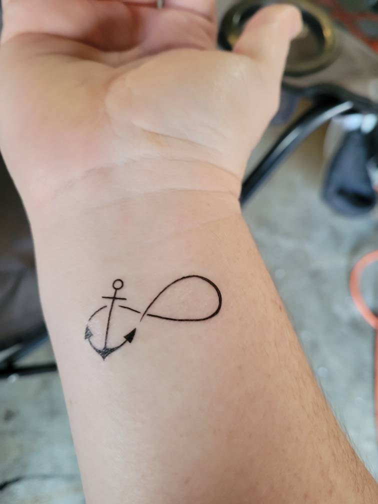 anchor infinity tattoos on hip