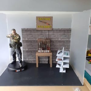 1/12スケール バイオハザード2 ジオラマ：ケンドー銃砲店と下水道。 ロバート・ケンドー バイオハザード2 1/6スケール スタチュー - Etsy 日本
