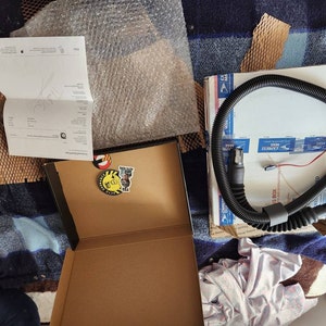 Sharon added a photo of their purchase