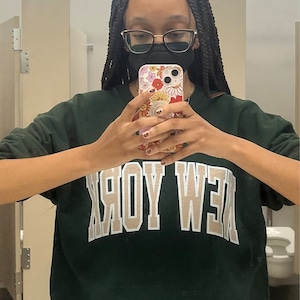 Taina added a photo of their purchase