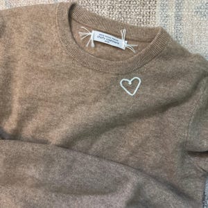 Katie added a photo of their purchase