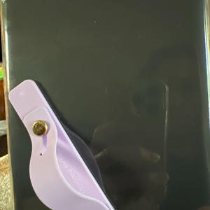 Alyson added a photo of their purchase