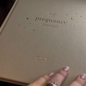 Holly added a photo of their purchase