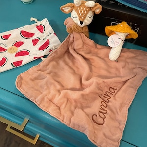 LAURA added a photo of their purchase