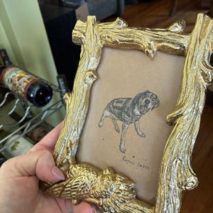 Alexandra added a photo of their purchase