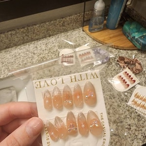 Lizzy added a photo of their purchase
