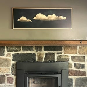 Laura's Vintage Clouds Canvas – Panoramic Wall Art | Extra Large Framed Print canvas print in their home — Antarmada
