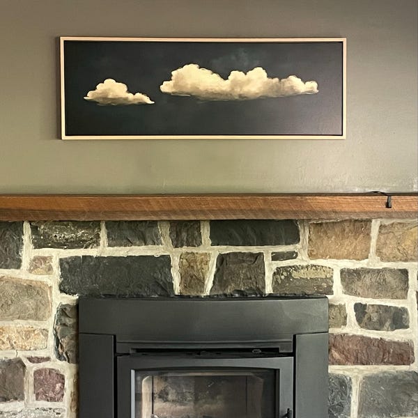 Laura's Vintage Clouds Canvas – Panoramic Wall Art | Extra Large Framed Print canvas print in their home — Antarmada