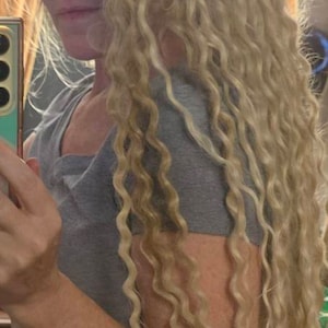 DEANNA added a photo of their purchase