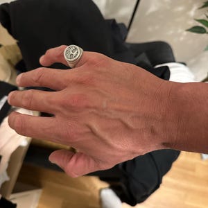 Roman added a photo of their purchase