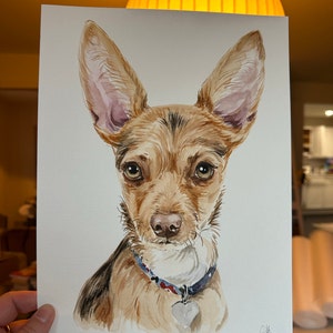 Alexandra added a photo of their purchase